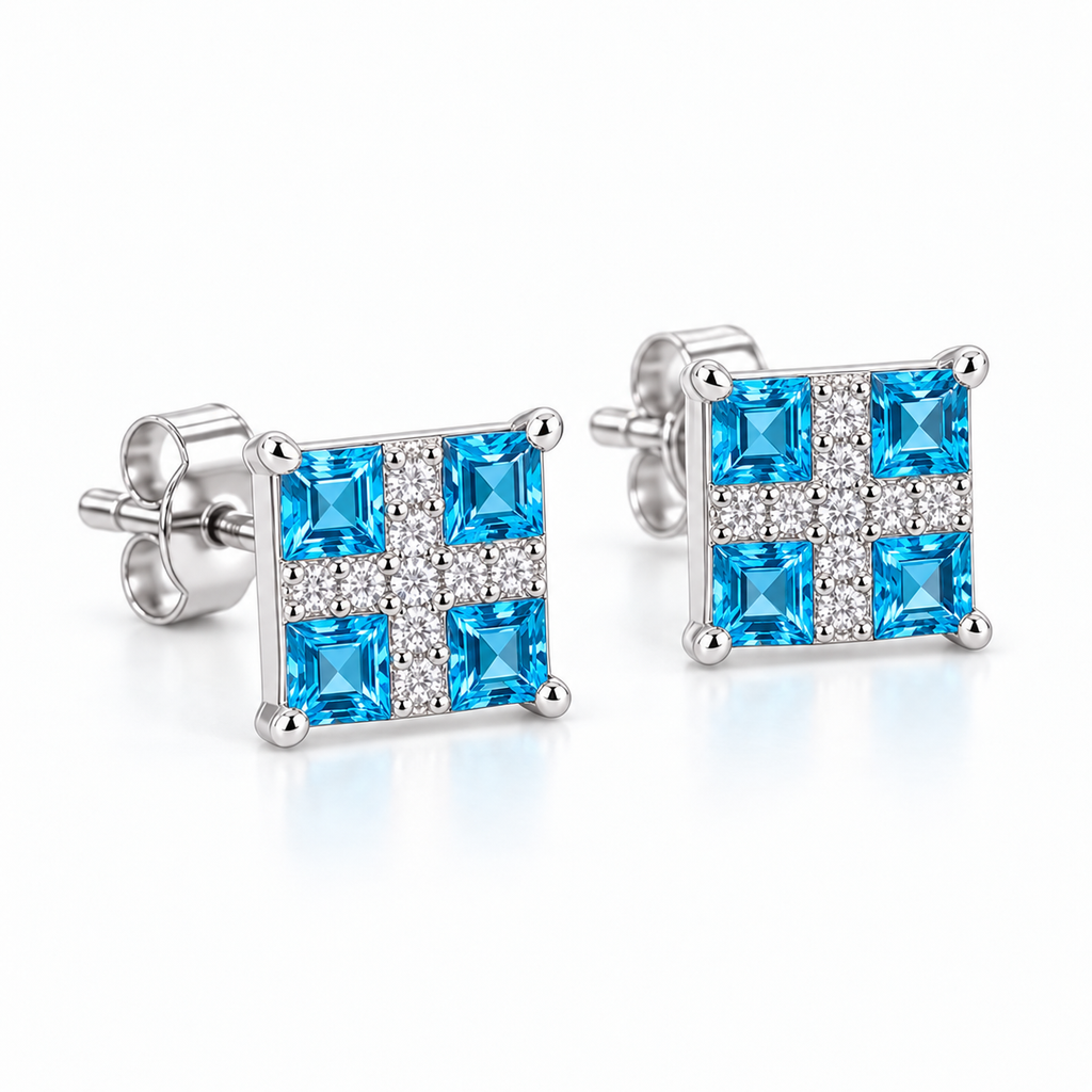 Angled Swiss Blue Topaz stud earrings with 3mm square gemstones and sterling silver settings