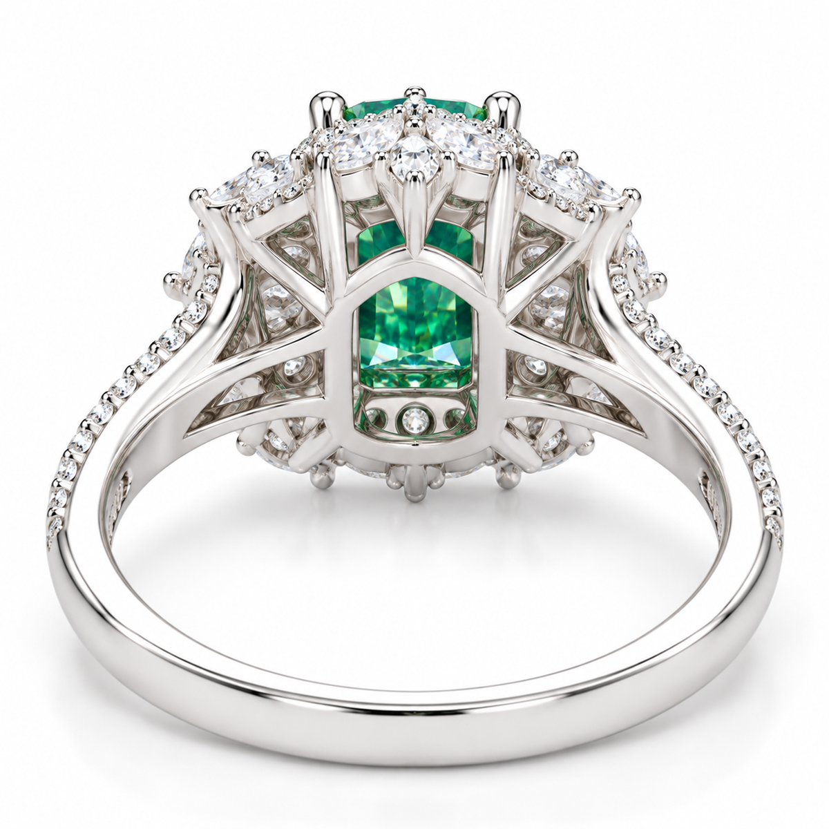 Detailed green moissanite halo ring featuring radiant cut center stone and floral-inspired gemstone setting