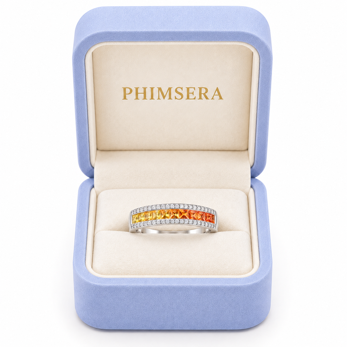 Phimsera natural yellow and orange sapphire ring presented in a luxury jewelry box.