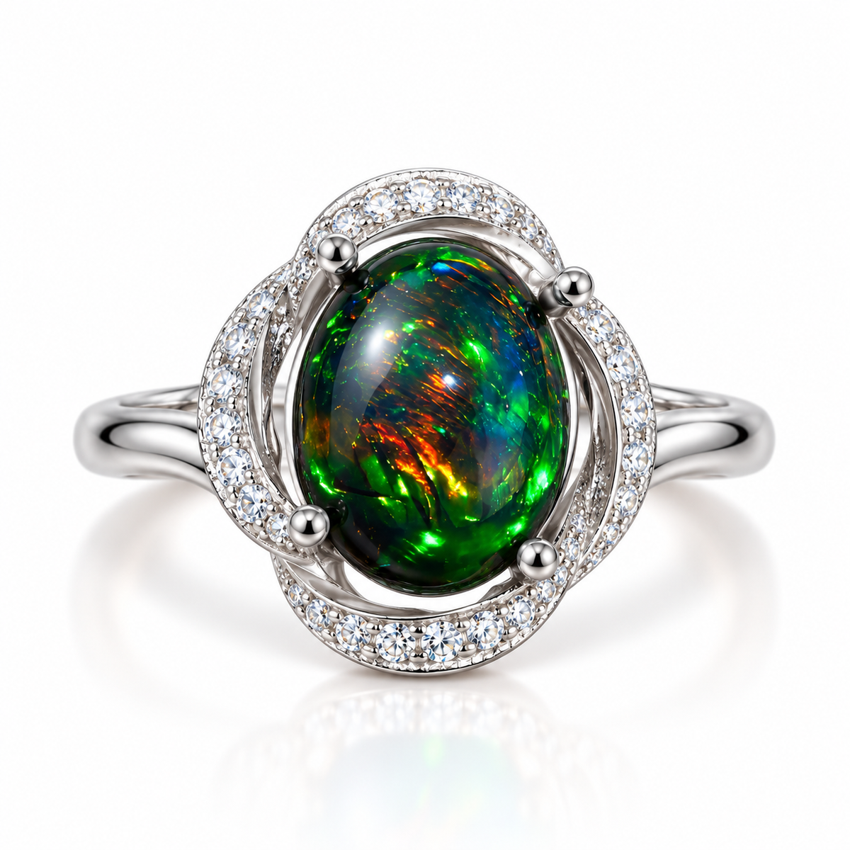 8x10mm Australian fire opal dyed black with colorful green, blue, and orange flashes in a silver-colored halo ring.