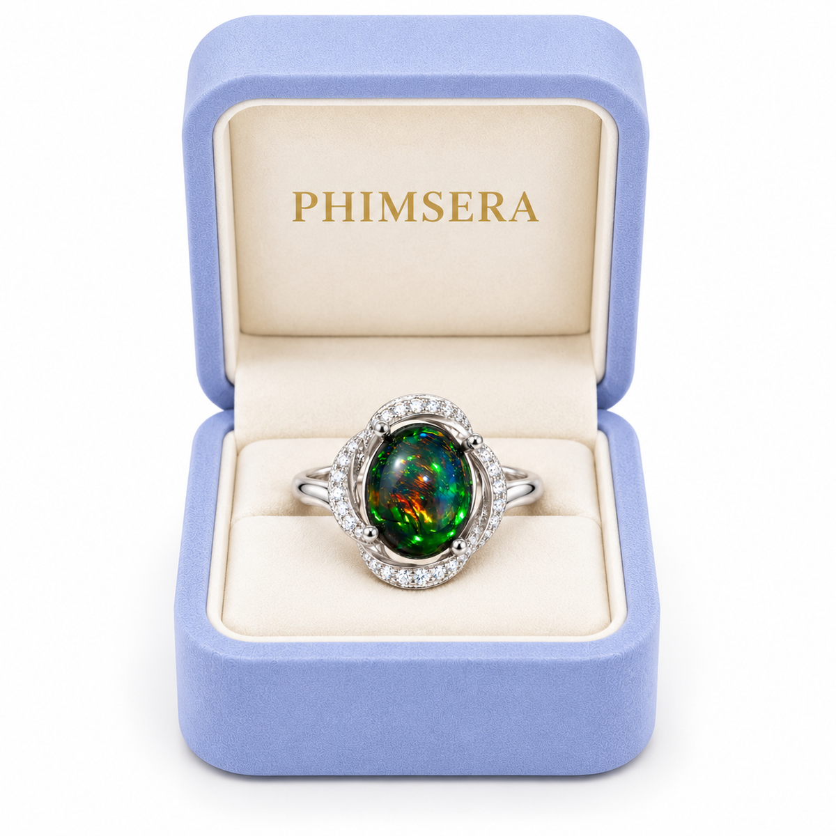 Australian dyed-black fire opal halo ring displayed in a Phimsera jewelry box with an ivory velvet interior.