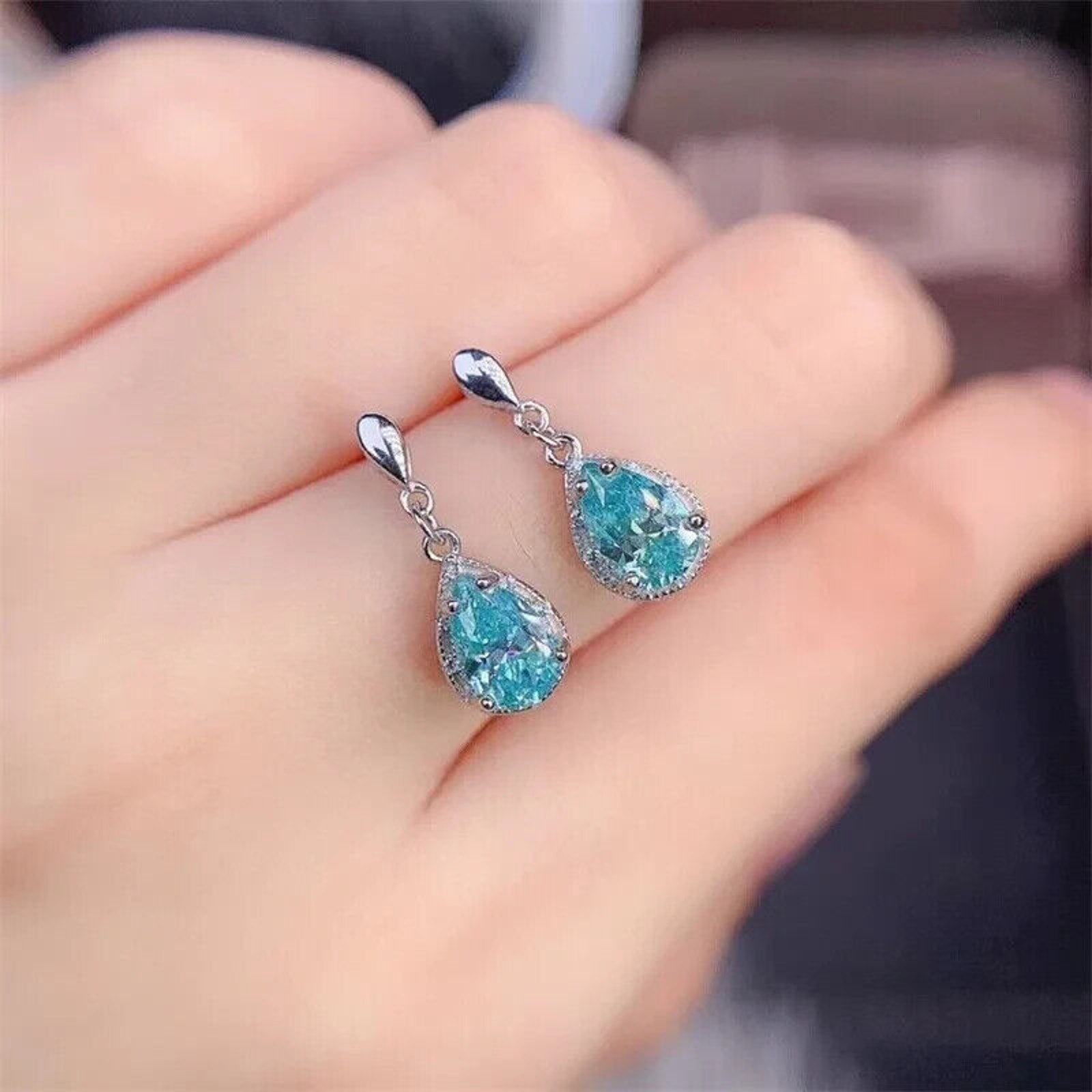 Moissanite Earrings, Moissanite Stud Earrings, Moissanite, White Moissanite, Green Moissanite, Moissanite Earrings Sterling Silver, VVS1 Moissanite Earrings, Green Moissanite Earrings, Green Moissanite Stud Earrings, Half Carat Moissanite Earrings, Women’s Green Moissanite Earrings, Green Moissanite Jewelry, Moissanite Jewelry, Round Brilliant Cut, Blue Moissanite, Blue Moissanite Earrings