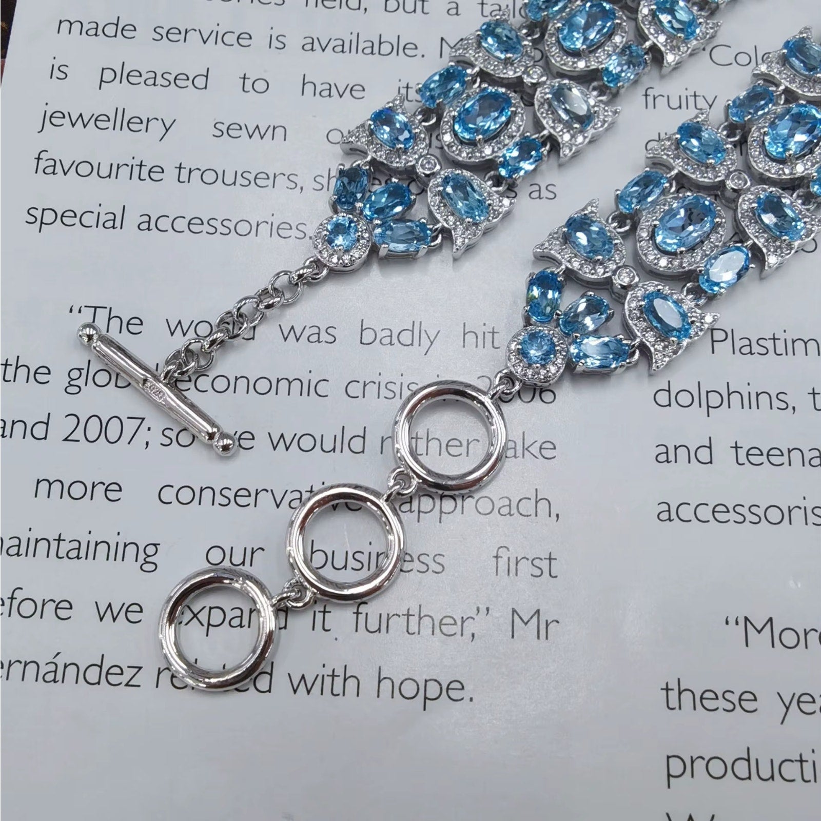 925 Silver Polished Natural Swiss Blue Topaz 4x6mm Oval-Cut Link Tennis Bracelet