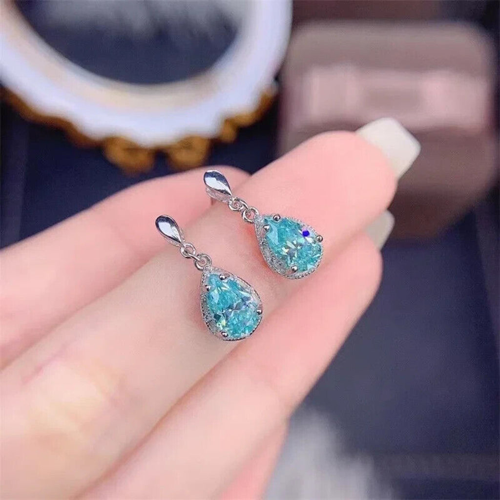 Moissanite Earrings, Moissanite Stud Earrings, Moissanite, White Moissanite, Green Moissanite, Moissanite Earrings Sterling Silver, VVS1 Moissanite Earrings, Green Moissanite Earrings, Green Moissanite Stud Earrings, Half Carat Moissanite Earrings, Women’s Green Moissanite Earrings, Green Moissanite Jewelry, Moissanite Jewelry, Round Brilliant Cut, Blue Moissanite, Blue Moissanite Earrings