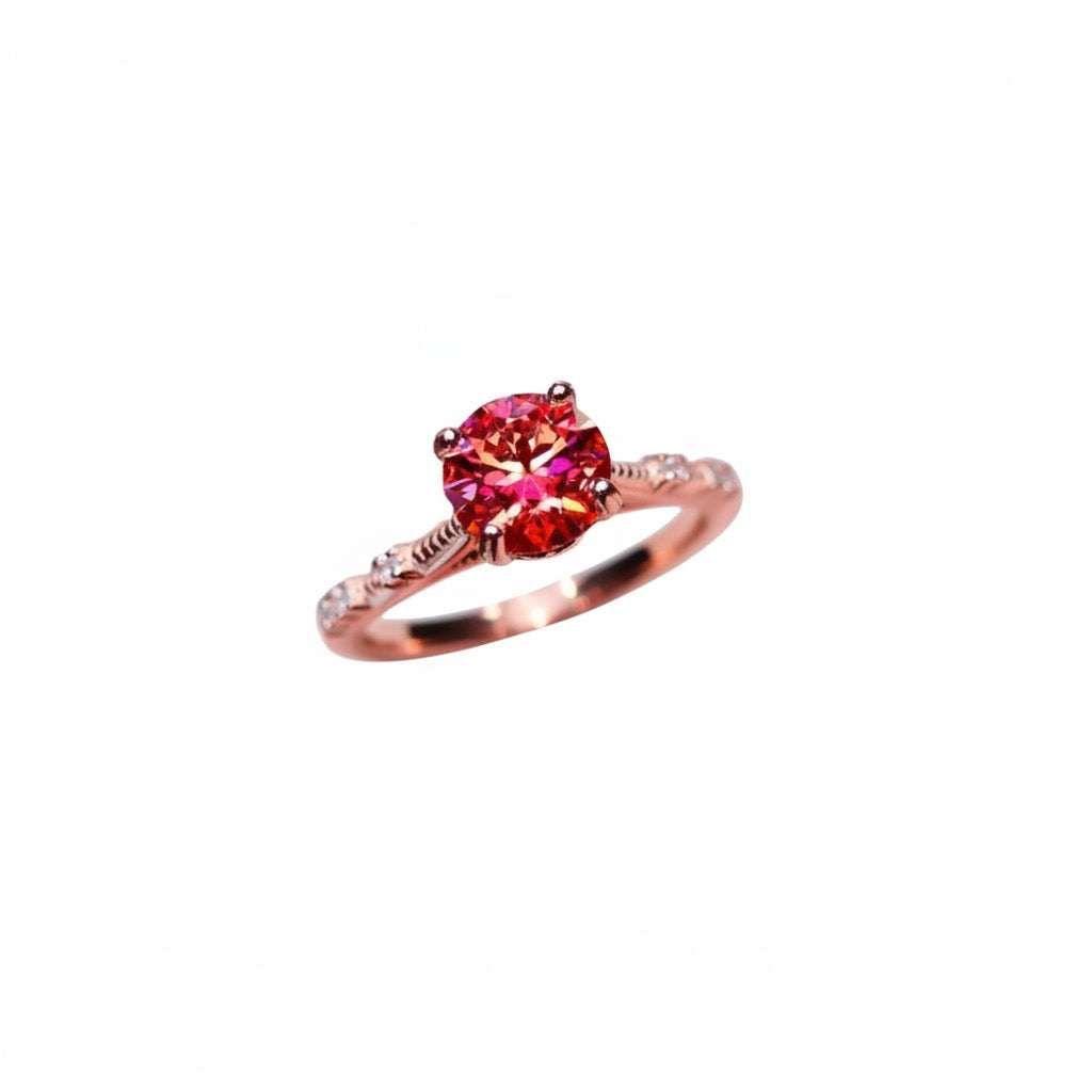 1 carat 6.5mm round Watermelon Red moissanite crown setting ring with cubic zirconia accents in rose gold plated sterling silver on a white background