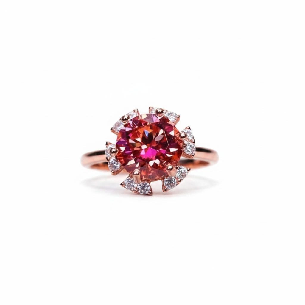 2 carat watermelon red round moissanite flower ring with cubic zirconia halo in rose gold plated 925 sterling silver on a white background
