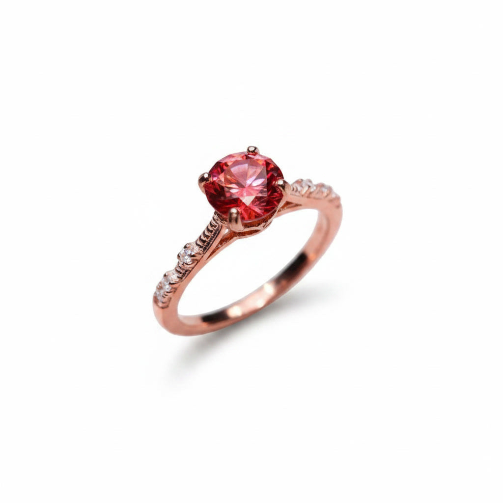 1 carat 6.5mm round Watermelon Red moissanite crown setting ring with cubic zirconia accents in rose gold plated sterling silver on a white background