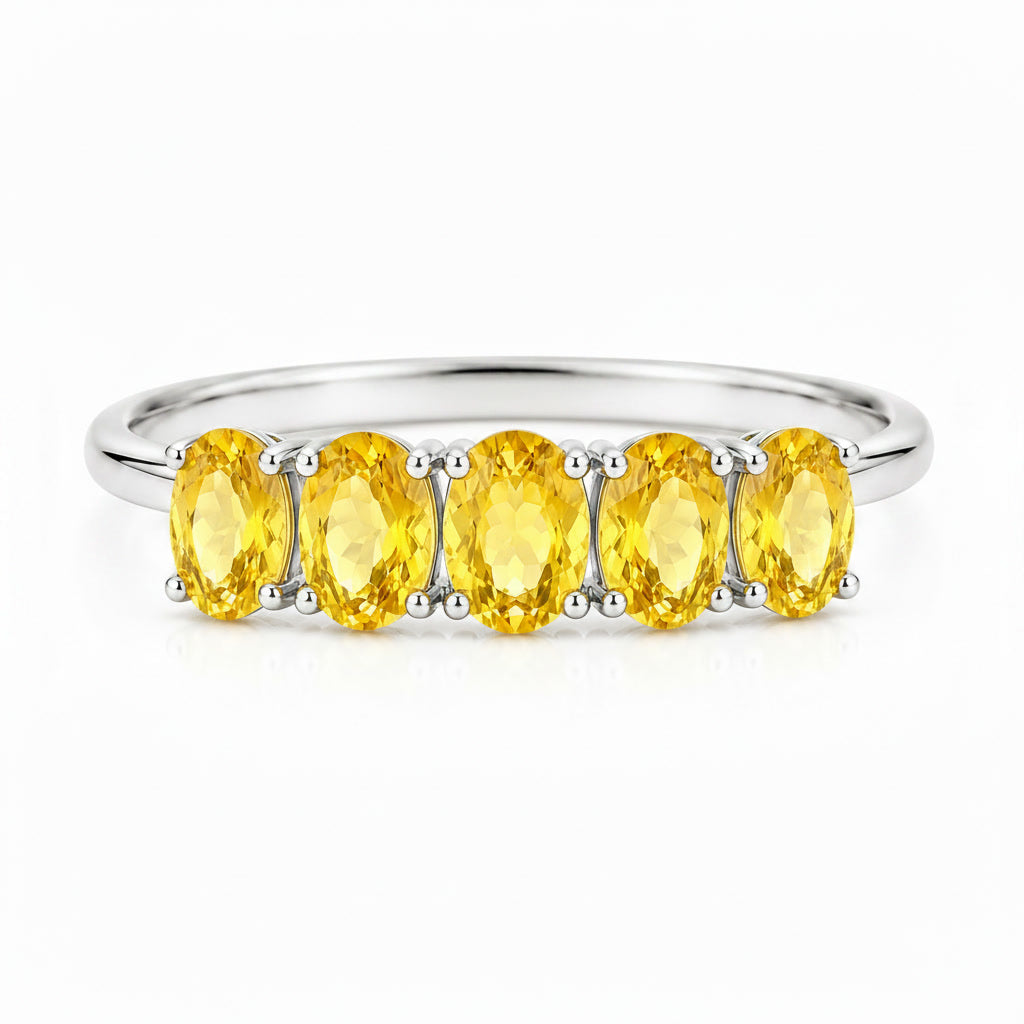 Top view of 3x4mm oval natural citrine five-stone ring