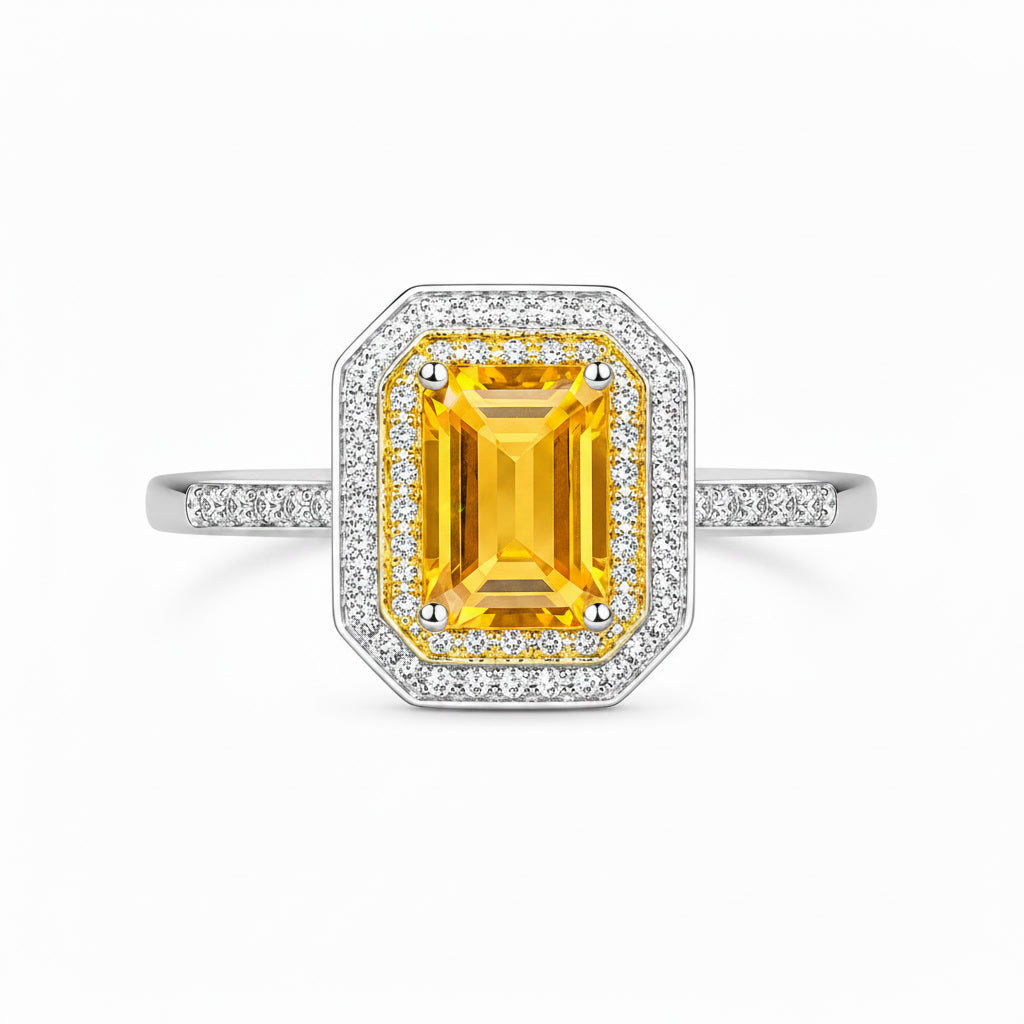 Top view of 6x8mm natural citrine ring with geometric double CZ halo