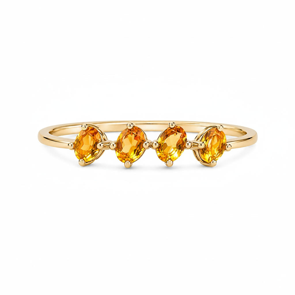 Top view of natural 3x4mm oval citrine multi-stone ring