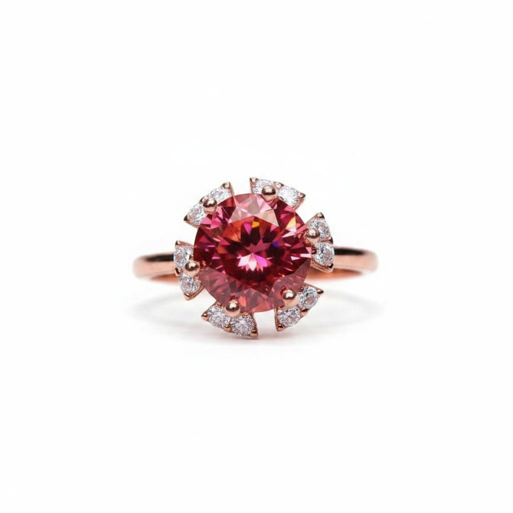 2 carat watermelon red round moissanite flower ring with cubic zirconia halo in rose gold plated 925 sterling silver on a white background