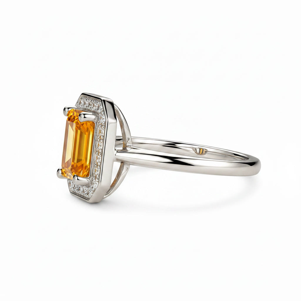 Side profile of emerald cut natural citrine halo ring in sterling silver