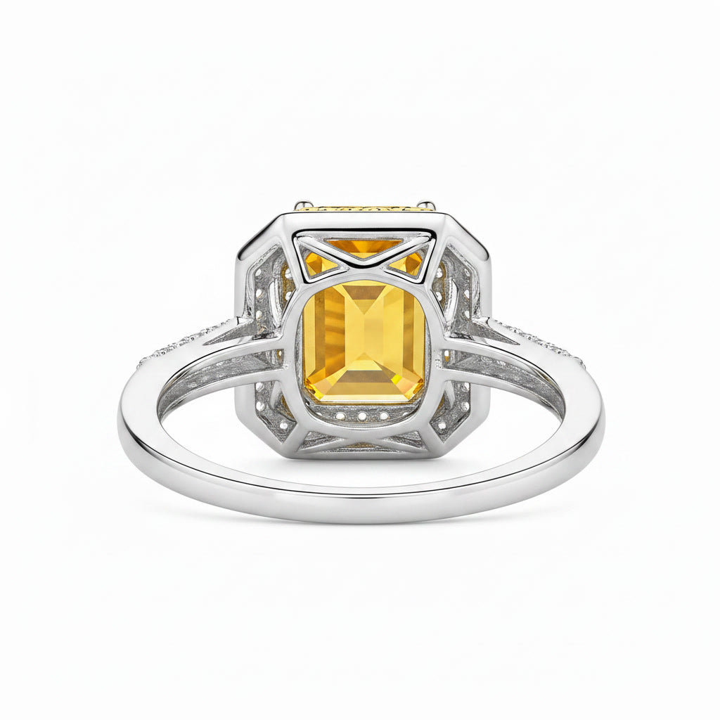 Side profile of natural emerald cut citrine double halo ring