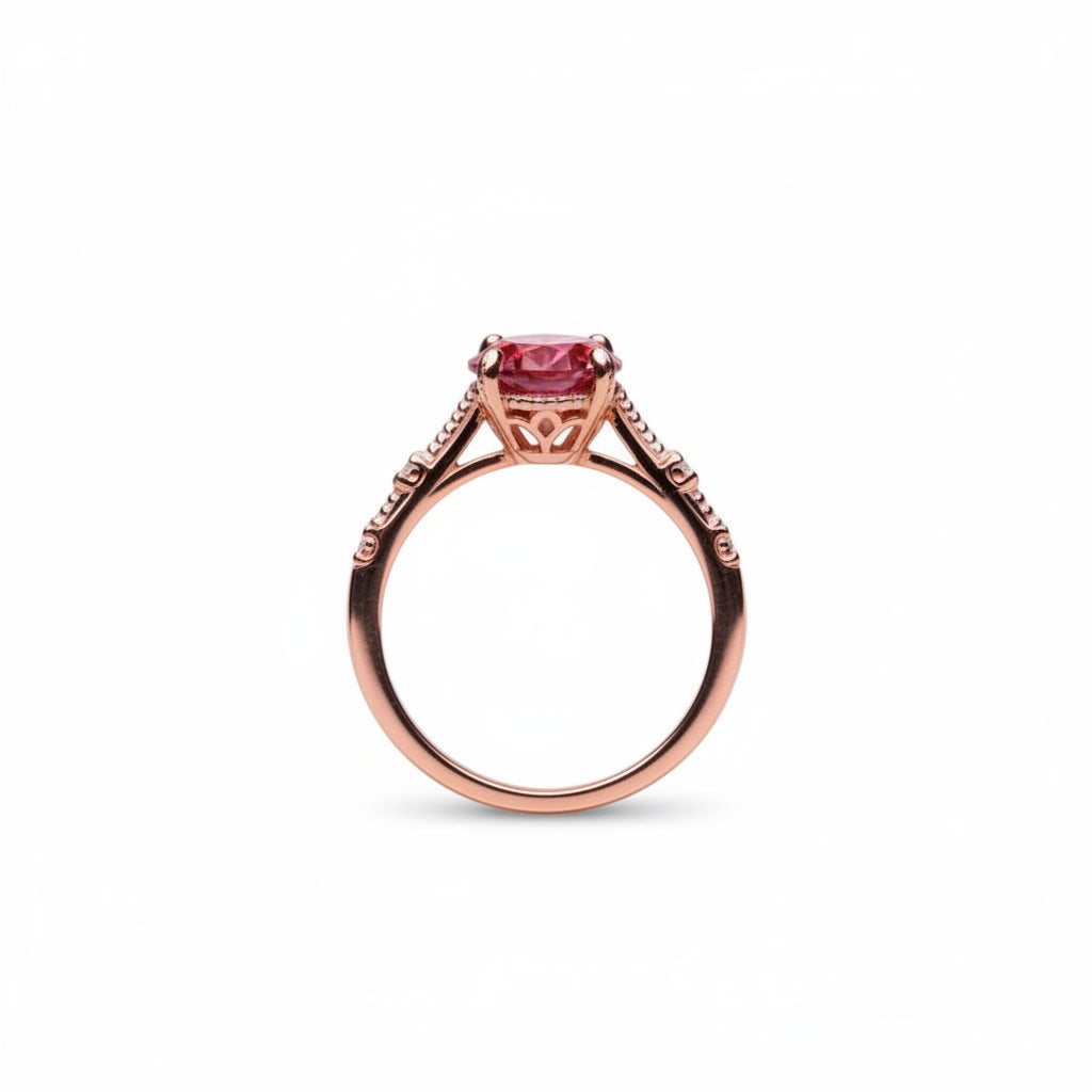 1 carat 6.5mm round Watermelon Red moissanite crown setting ring with cubic zirconia accents in rose gold plated sterling silver on a white background