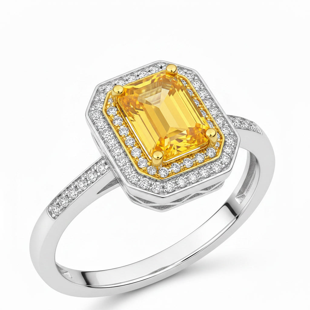 Close-up of 6x8mm emerald cut natural citrine and sparkling double CZ halo