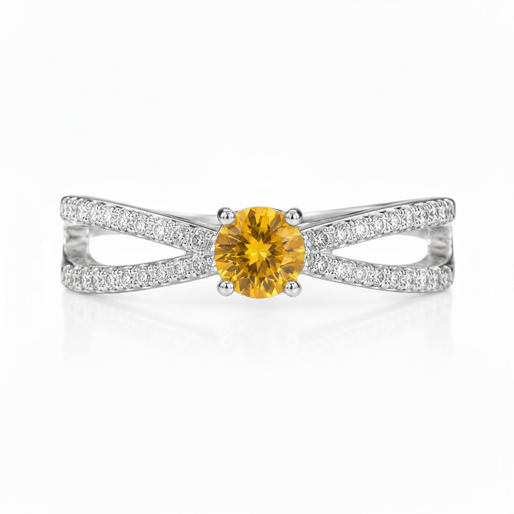Close-up of 4mm round natural citrine gemstone and sparkling CZ crossover accents