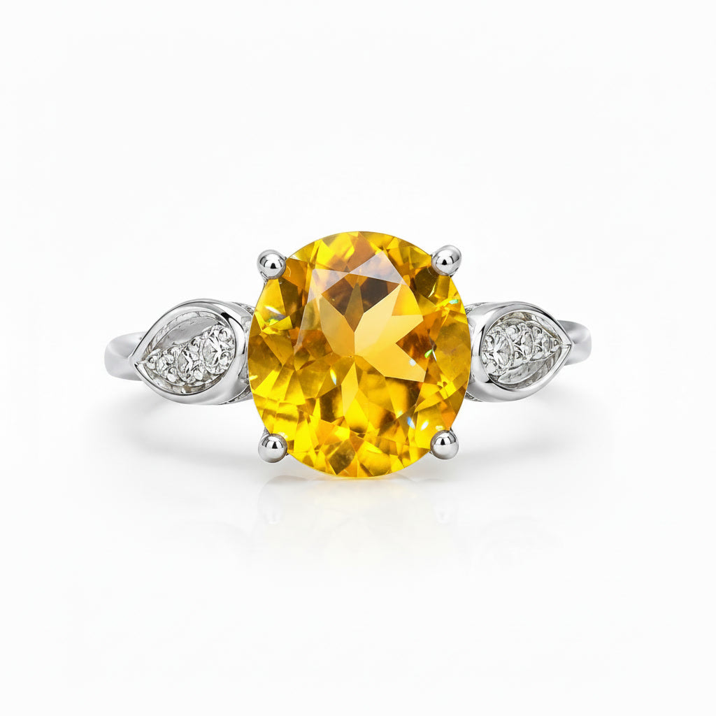 Close-up of natural 8mm golden citrine gemstone and CZ leaf details