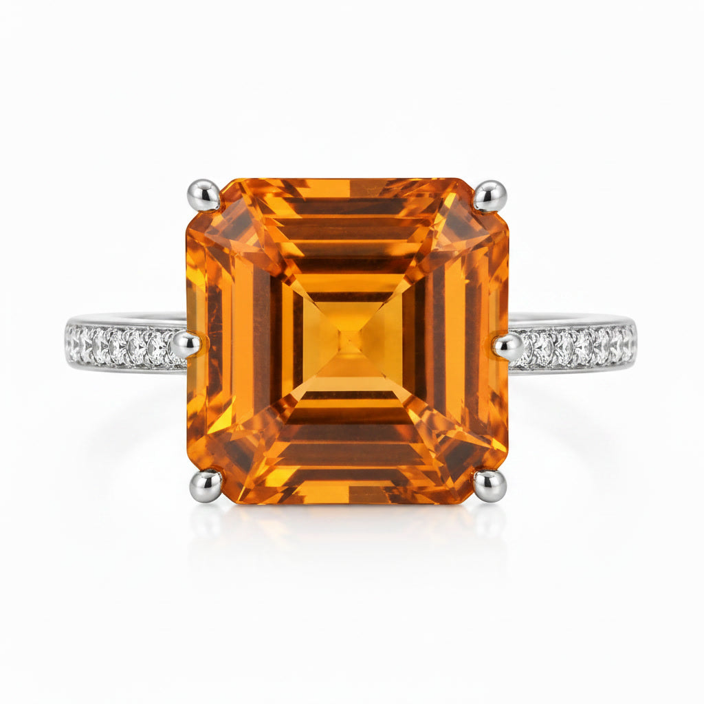 Macro close-up of 12mm Asscher cut natural citrine showing geometric step facets
