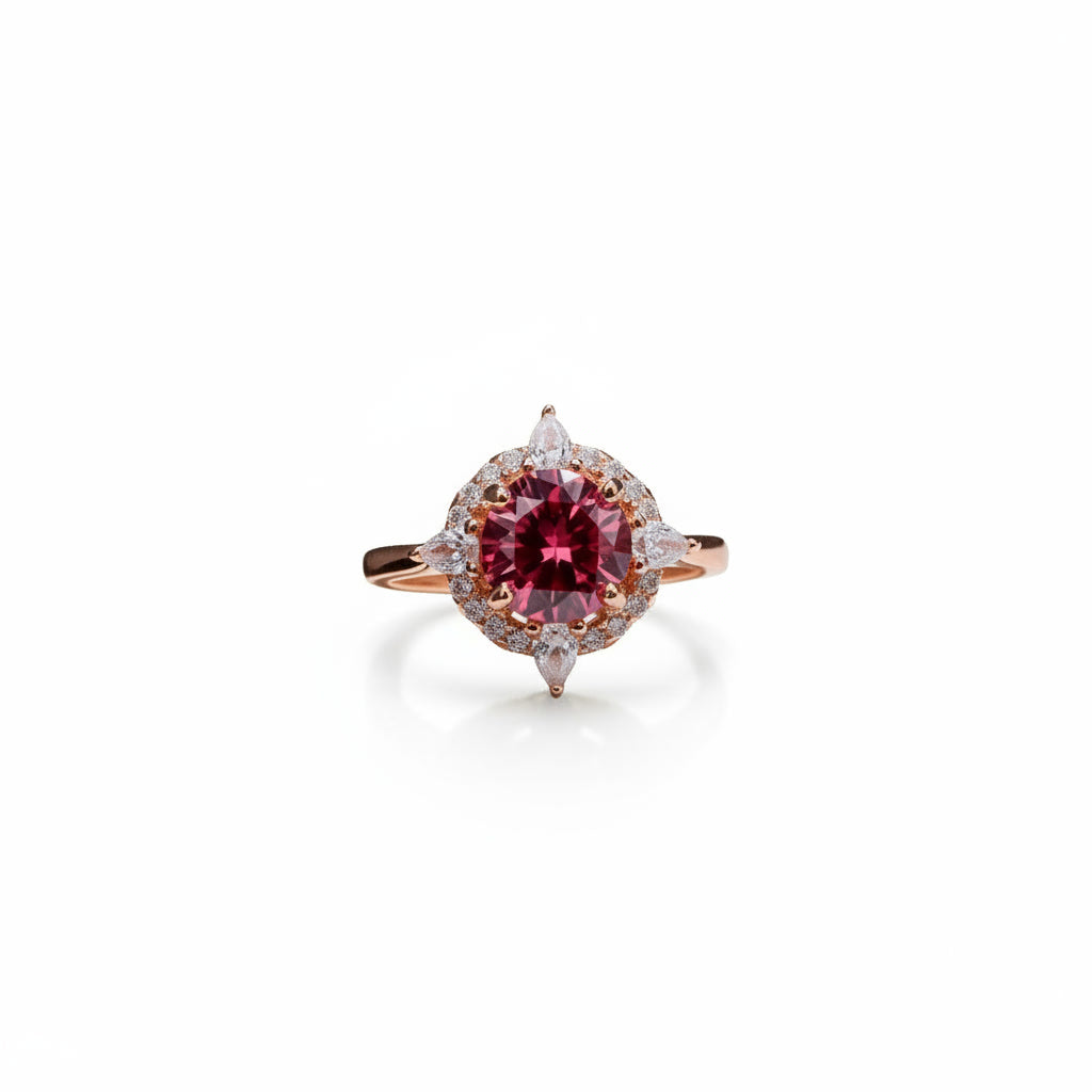 1 carat 6.5mm round raspberry red moissanite flower halo ring in rose gold plated sterling silver with cubic zirconia accents on a white background