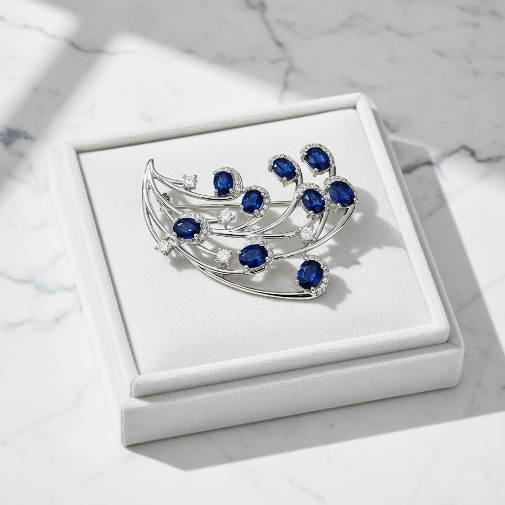 Natural Blue Sri Lanka Sapphire Brooch Pin in 925 Sterling Silver featuring nine 4x5 mm oval natural sapphires with cubic zirconia accents