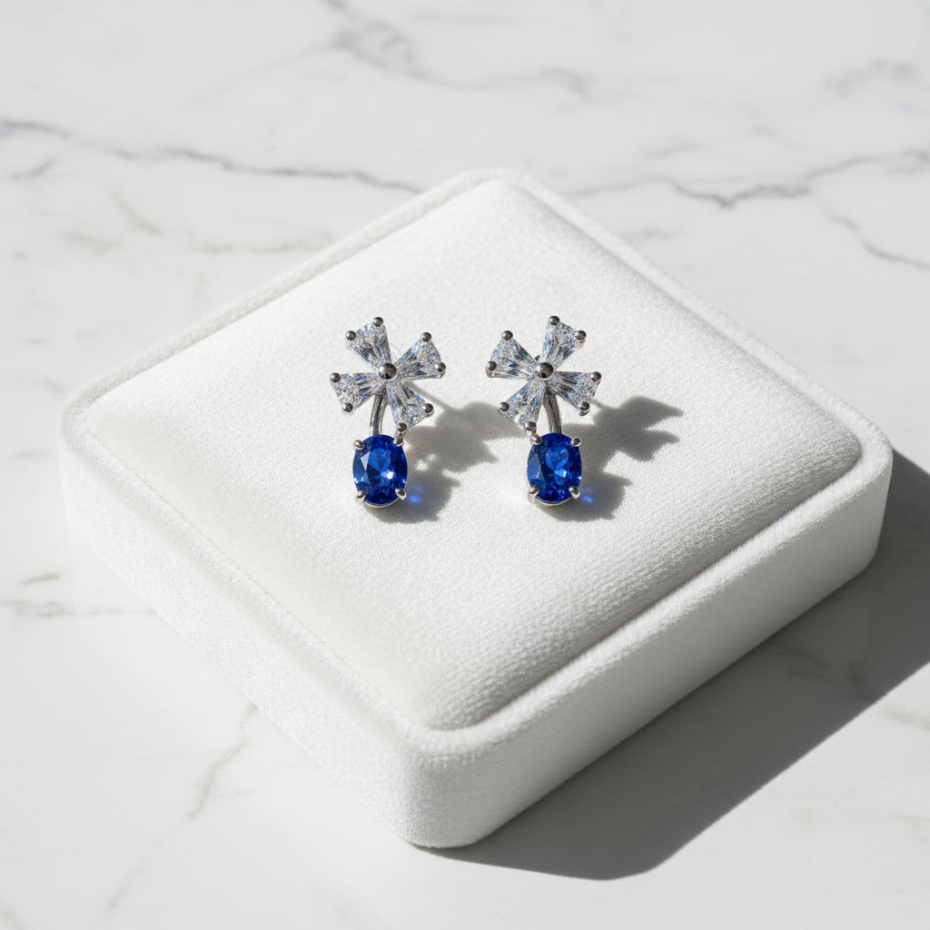 Natural Blue Sri Lanka Sapphire dainty stud earrings in 925 sterling silver featuring genuine 3×4 mm oval Ceylon sapphires with sparkling cubic zirconia accents