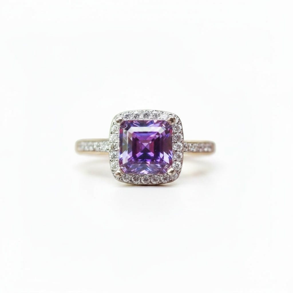 Purple Asscher cut moissanite halo ring featuring a 6×6mm lab-created center stone surrounded by sparkling cubic zirconia in sterling silver.