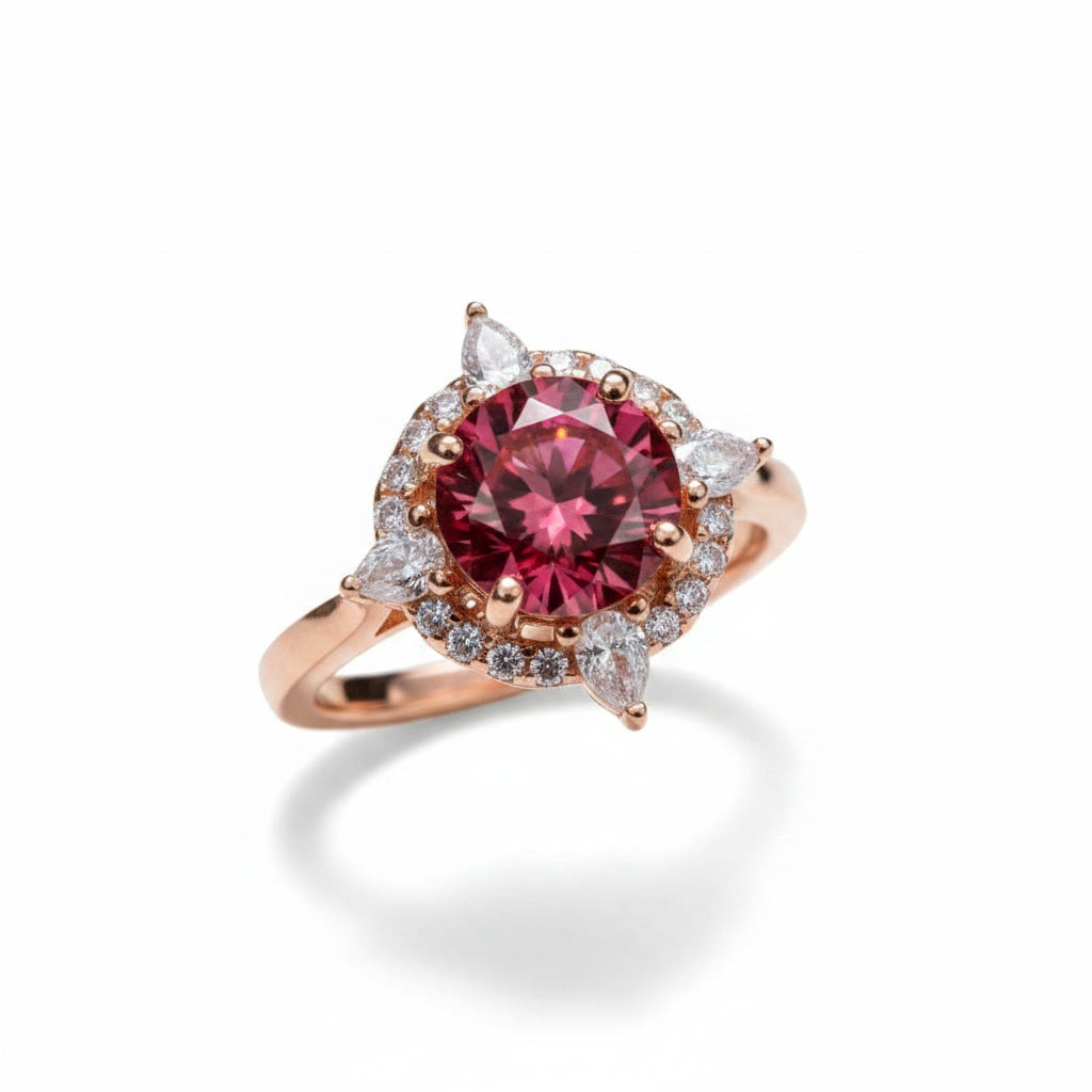 1 carat 6.5mm round raspberry red moissanite flower halo ring in rose gold plated sterling silver with cubic zirconia accents on a white background