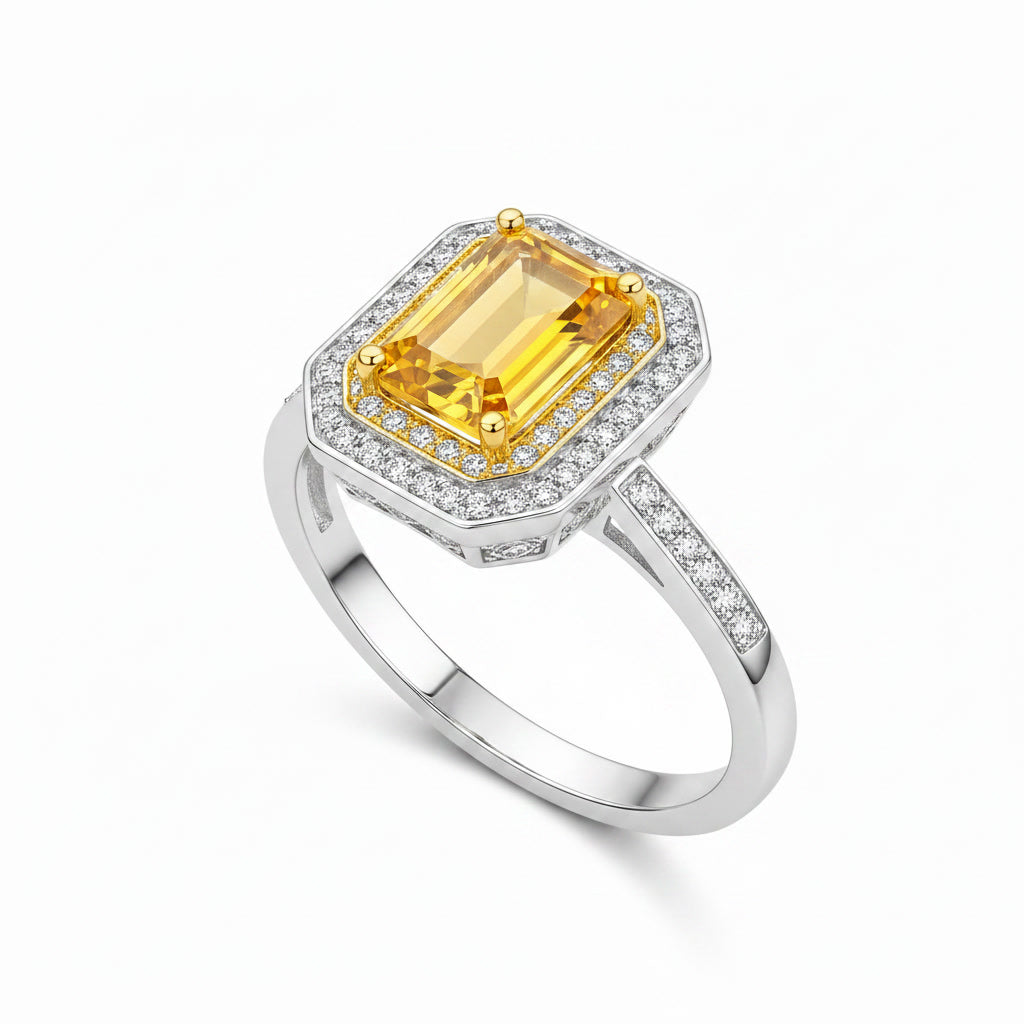 Natural emerald cut citrine double halo ring shown at 45 degree angle