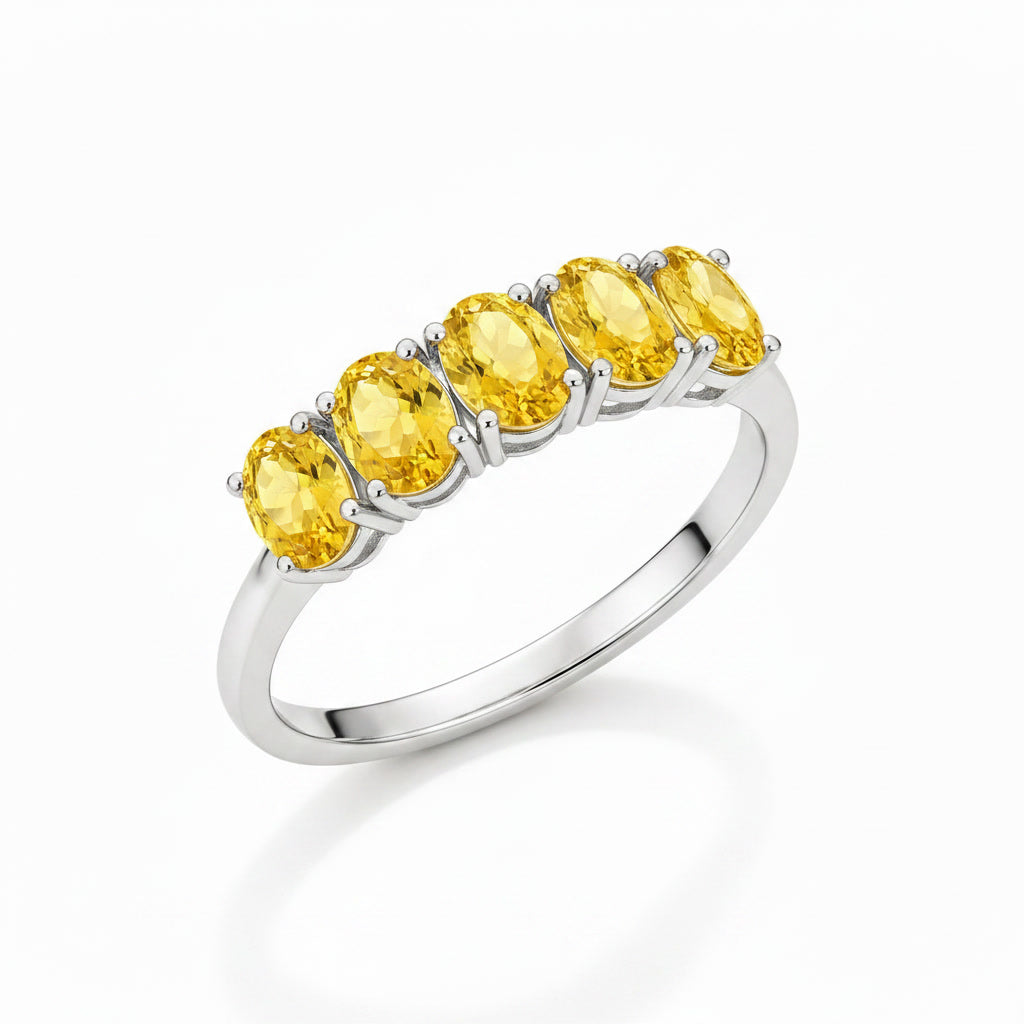 Five-stone natural citrine band ring shown at 45 degree angle