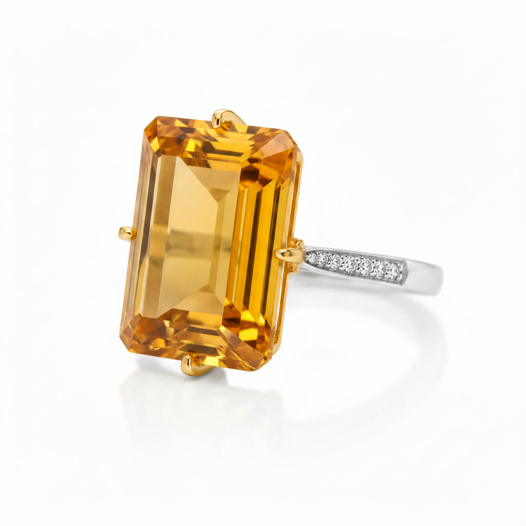 Large natural 10x14mm emerald cut citrine gemstone ring shown at 45 degree angle