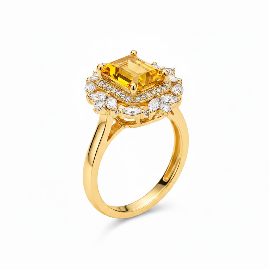 Front view of natural golden citrine emerald cut halo ring with marquise cubic zirconia accents