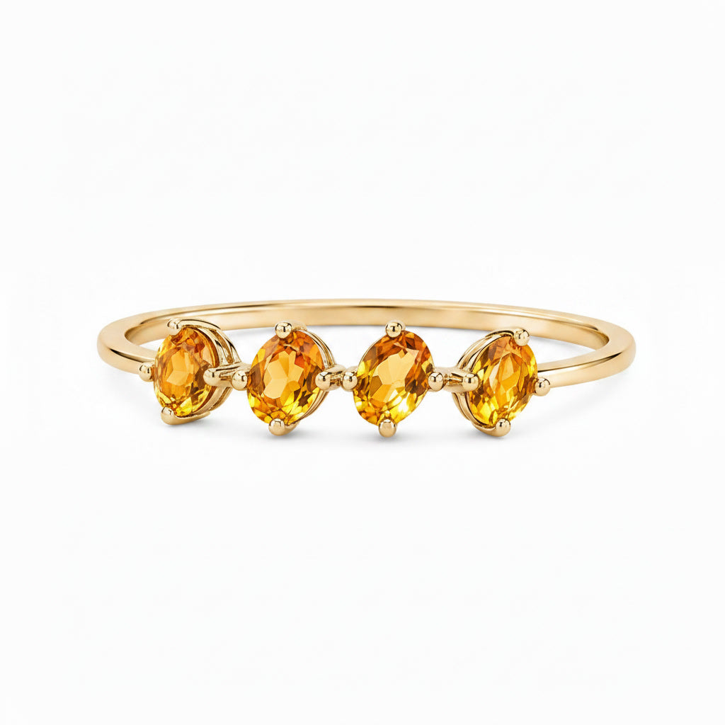 Natural citrine gemstone band with four oval-cut citrine stones at 45 degree angle