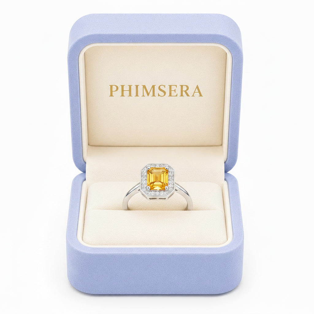 Natural 6x8mm citrine halo ring presented in Phimsera jewelry gift box