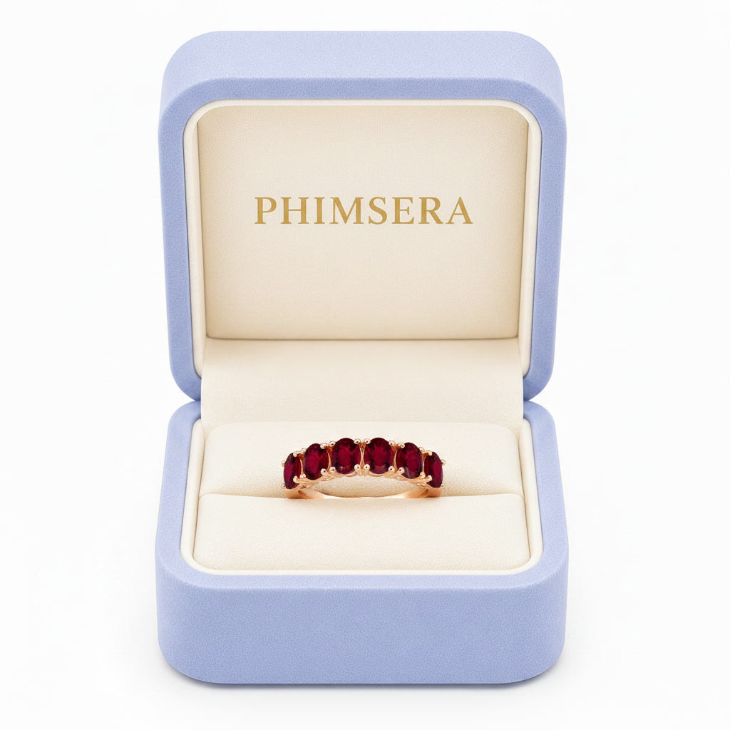 Natural 3x4mm oval ruby band ring presented in Phimsera jewelry gift box