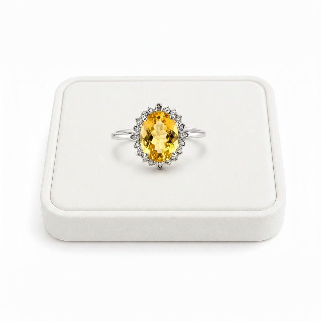 6 carat natural citrine halo ring displayed on white velvet jewelry tray