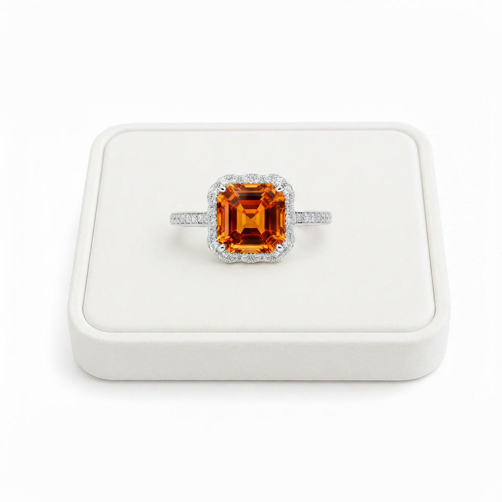 Natural 10mm Asscher cut citrine halo ring displayed on white velvet jewelry tray
