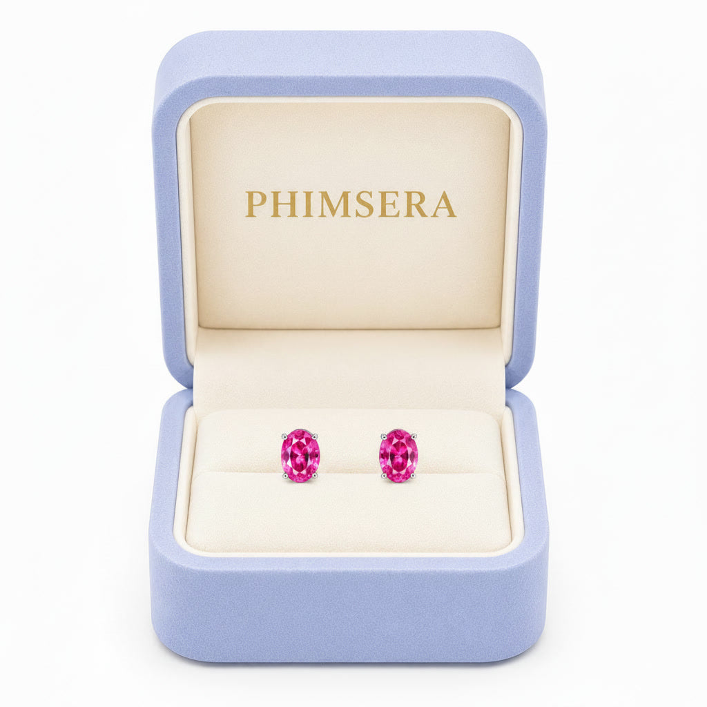 Natural 4x6mm oval pink topaz stud earrings in 925 sterling silver with platinum plated finish in Phimsera Jewelry Box