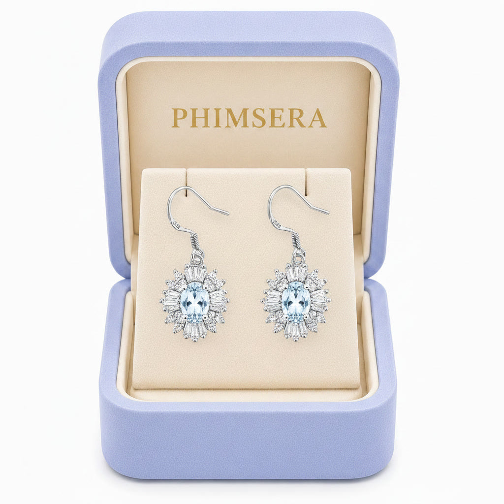 Natural 4x6mm Sky Blue Topaz floral halo dangle earrings in Platinum Plated 925 sterling silver with cubic zirconia accents in Phimsera box