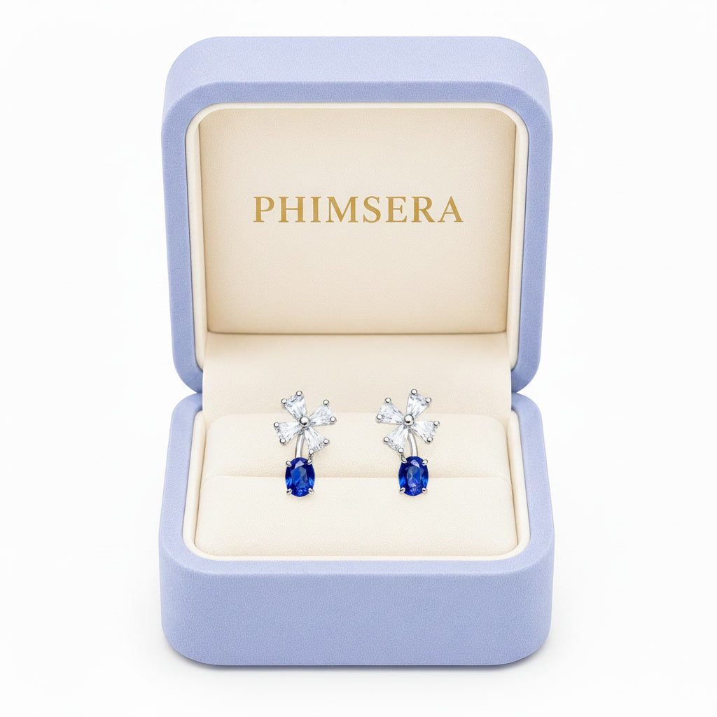 Natural Blue Sri Lanka Sapphire dainty stud earrings in 925 sterling silver featuring genuine 3×4 mm oval Ceylon sapphires with sparkling cubic zirconia accents