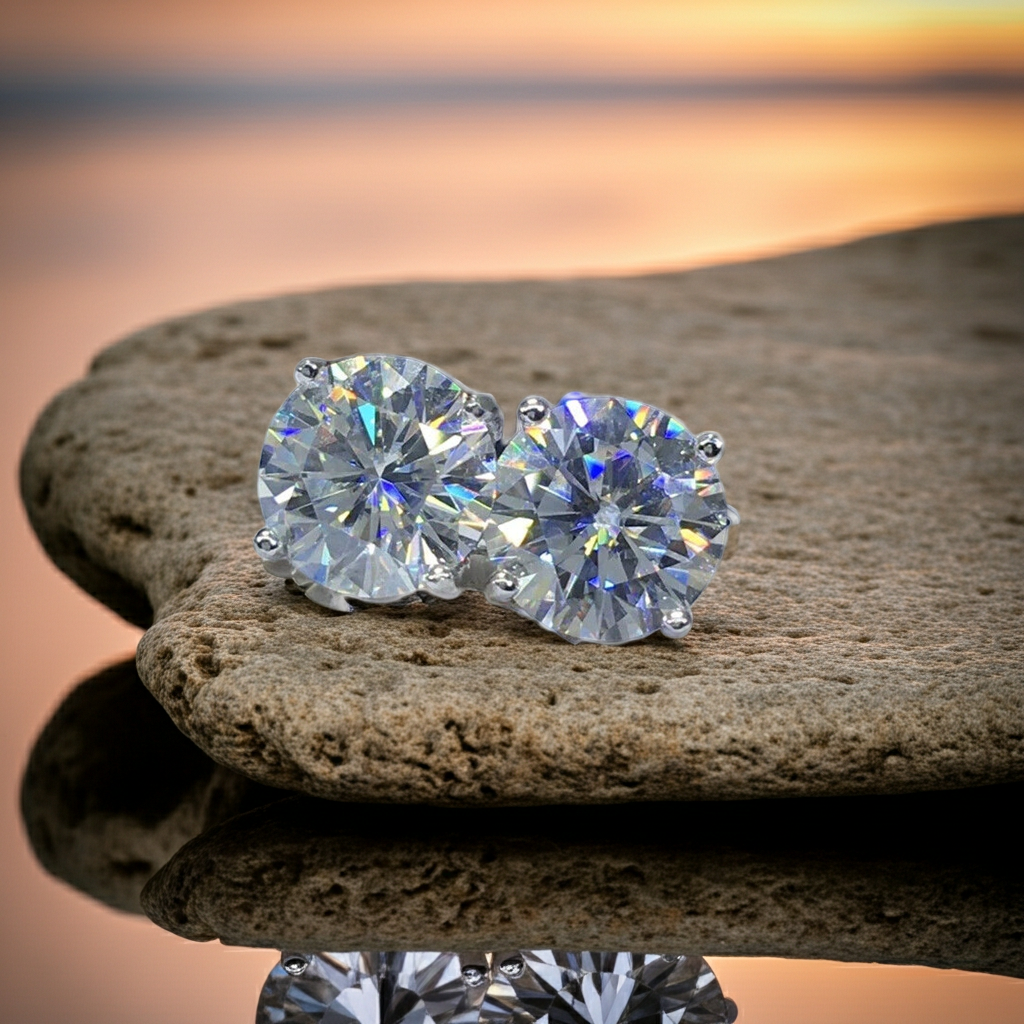 PHIMSERA VVS1 round brilliant moissanite stud earrings in platinum plated 925 sterling silver available in 1CT 2CT or 3CT sizes