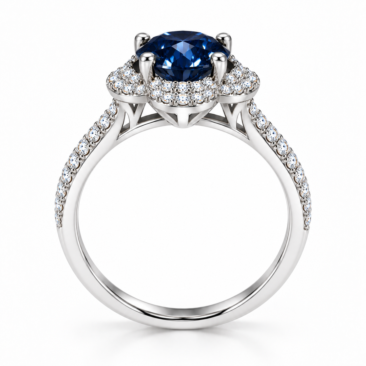 Side profile of a 2 carat deep blue moissanite floral halo ring revealing the raised gemstone basket, open gallery, four-prong setting and pavé-accented 925 sterling silver band.