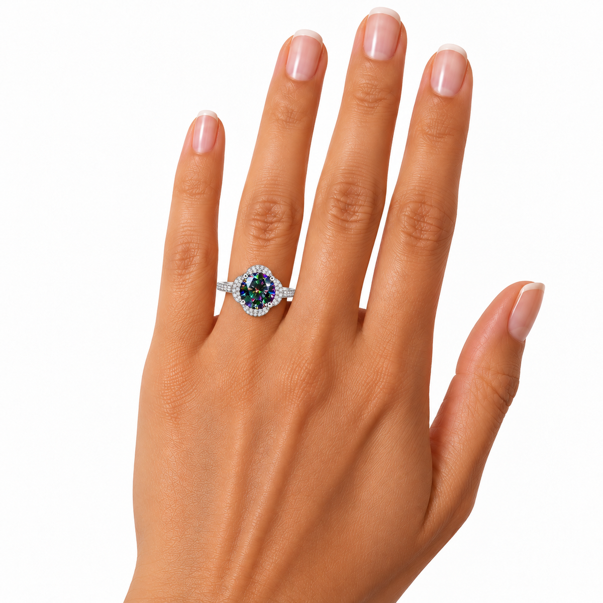 Phimsera 2 carat black rainbow moissanite floral halo ring worn on a woman's ring finger, displaying the 8mm round brilliant multicolored gemstone, sparkling cubic zirconia floral setting and slender sterling silver band against white.