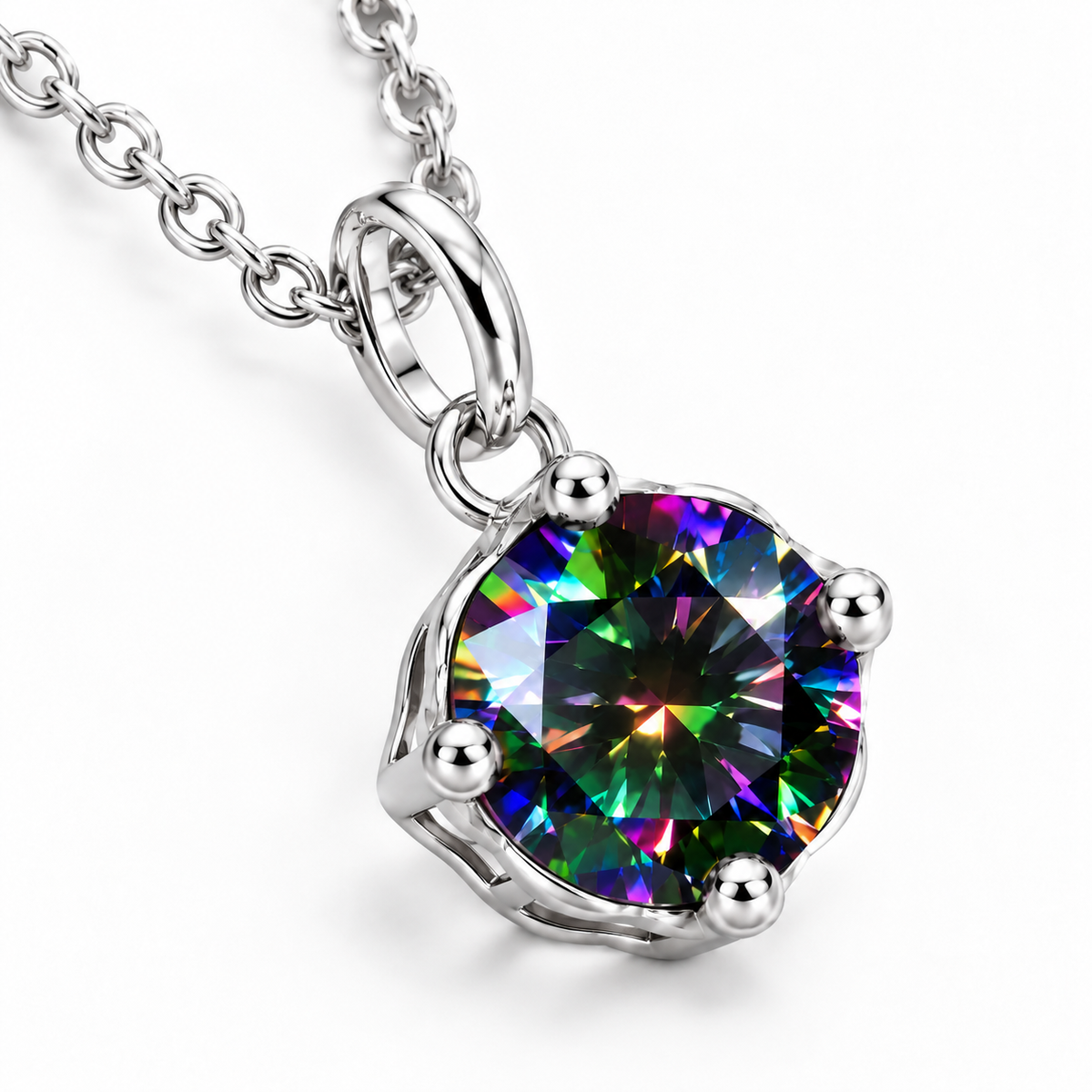 Angled view of an 8mm black rainbow moissanite pendant necklace displaying vivid green, blue, violet, and magenta reflections, four polished silver prongs, an open solitaire basket setting, and a sterling silver chain.