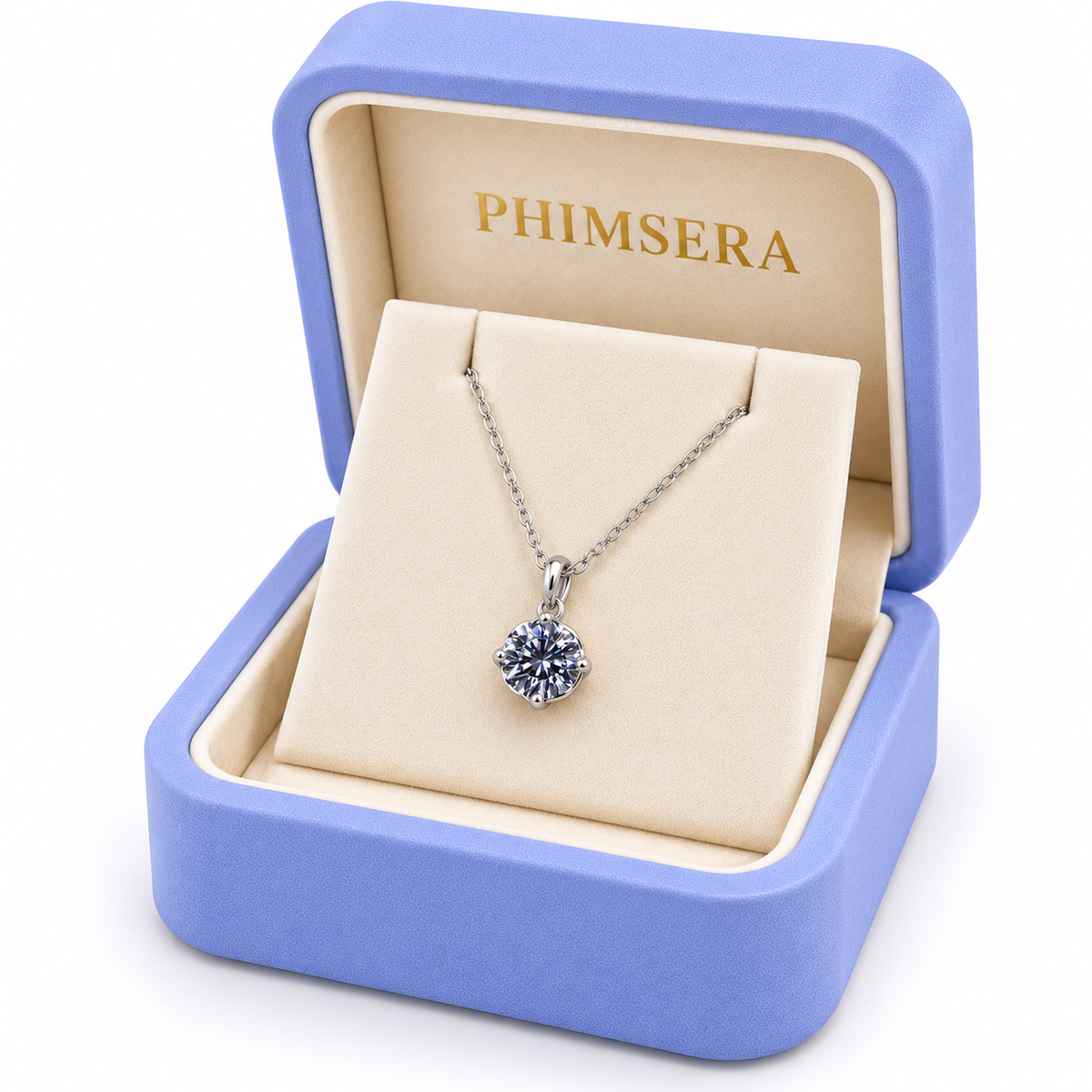 Angled presentation of a Phimsera periwinkle jewelry gift box containing a delicate sterling silver necklace with a brilliant 8mm round gray moissanite pendant and elegant ivory jewelry insert.