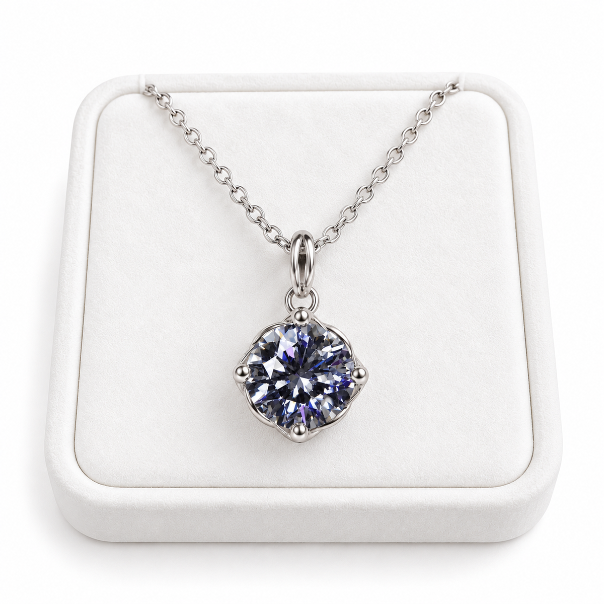 2 carat gray moissanite solitaire necklace displayed on a premium white velvet jewelry tray with its delicate sterling silver chain, round brilliant smoky gray gemstone, and polished silver pendant setting.