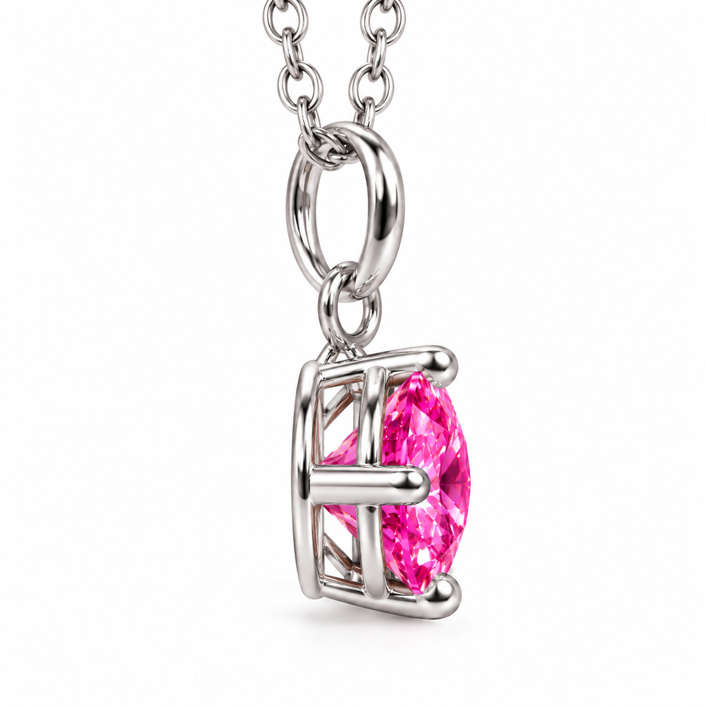 Side profile of a 2 carat pink moissanite pendant necklace showing the depth of the brilliant 8mm gemstone, open silver basket setting, four-prong construction, and polished oval bail on a white background.