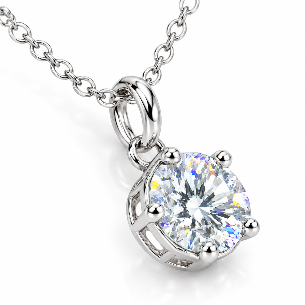 Macro angled photograph of a 2 carat white moissanite pendant highlighting its round brilliant facets, delicate rainbow fire, polished silver prongs, and open solitaire setting.