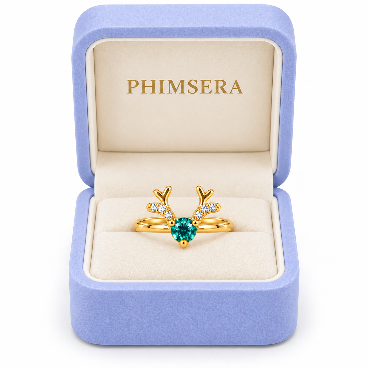 Phimsera green moissanite Christmas reindeer antler ring displayed in an open periwinkle jewelry gift box with ivory interior and gold Phimsera branding.