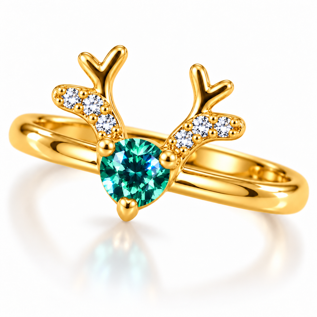 Angled view of a gold-plated sterling silver Christmas reindeer ring featuring a 4mm round brilliant-cut green moissanite gemstone secured by three prongs and decorative CZ antlers.