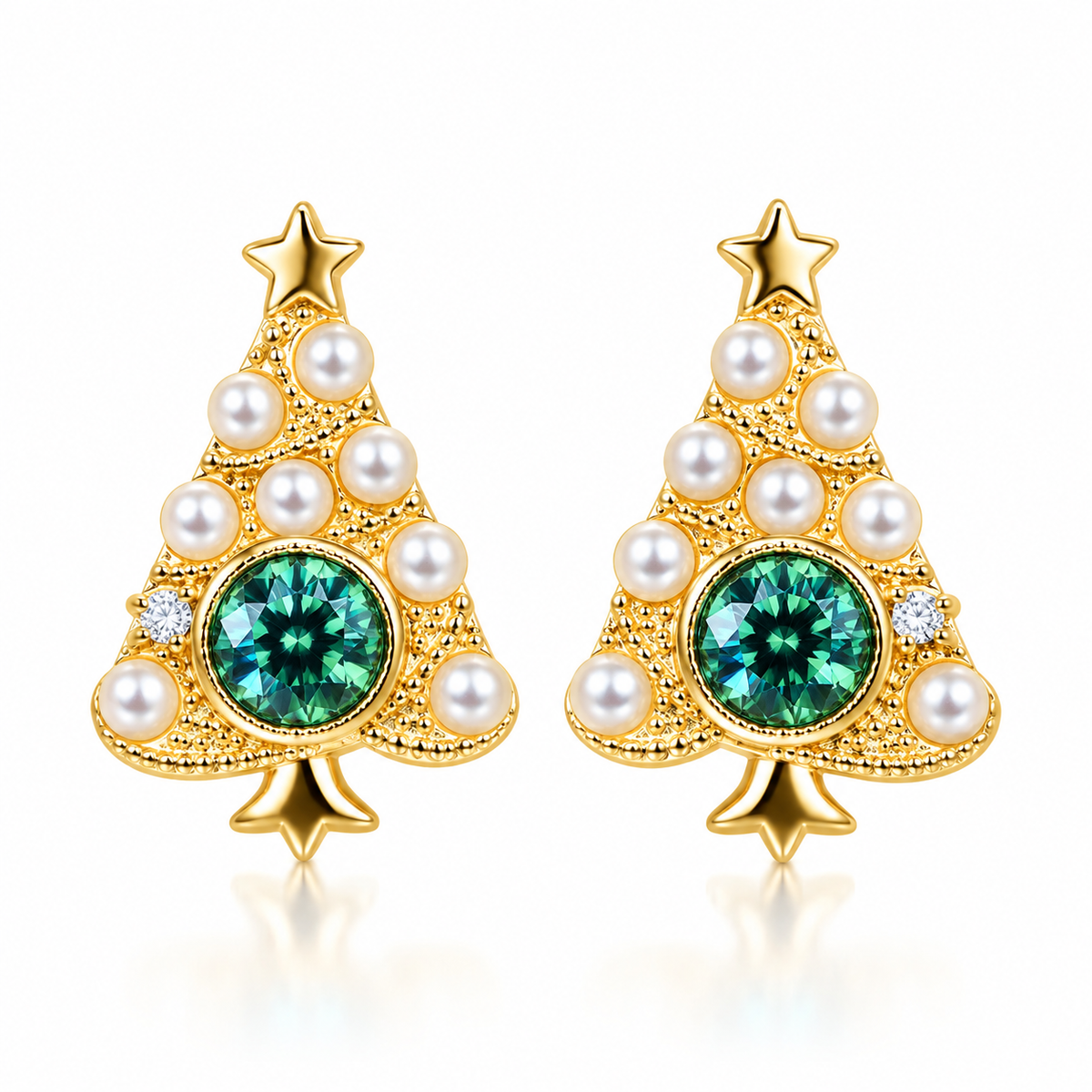 Pair of gold Christmas tree stud earrings with 4mm teal-green moissanite, white pearl-style ornaments and star toppers on white.